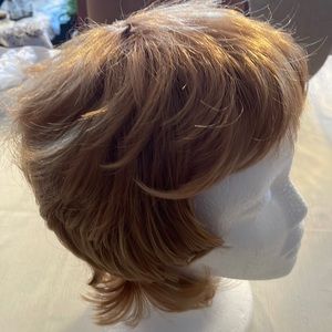 Nwot, wig average size. Adjustable at the neck.